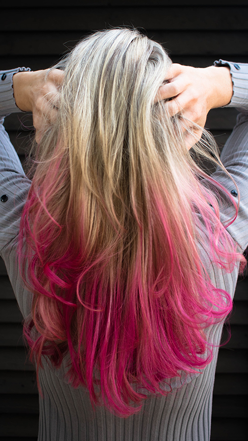 Woman with a blonde and pink ombre