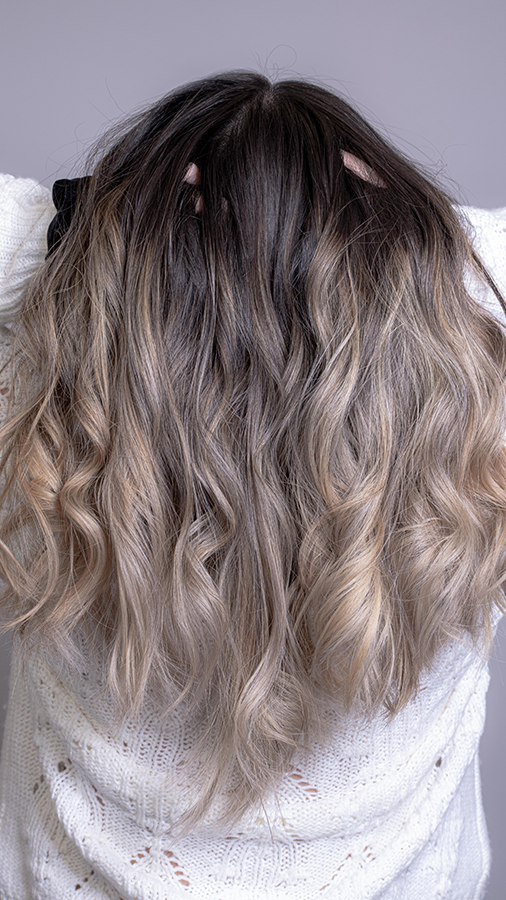 Woman with a cold dark to blonde ombre