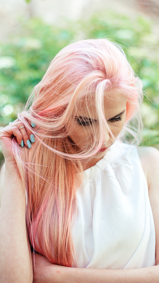 Woman with a strawberry pink ombre